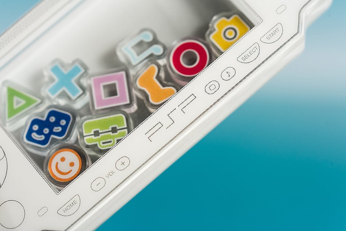PRE-ORDER Good Smile Company - PSP™ (PlayStation™Portable) Rattle Acrylic Keychain: White Ver.